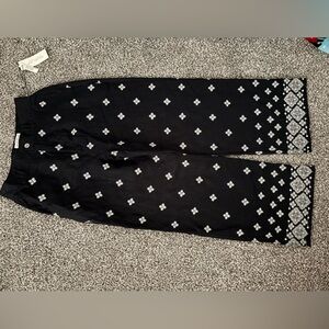 Black pants with white snow flake design